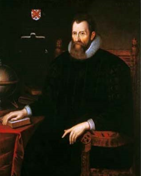 Image shows portrait of a man with a beard sitting in a wooden chair that is covered in red fabric. He is wearing a long black cloak with a tall white collar. The background is a dark brown with a crest in the top left corner.